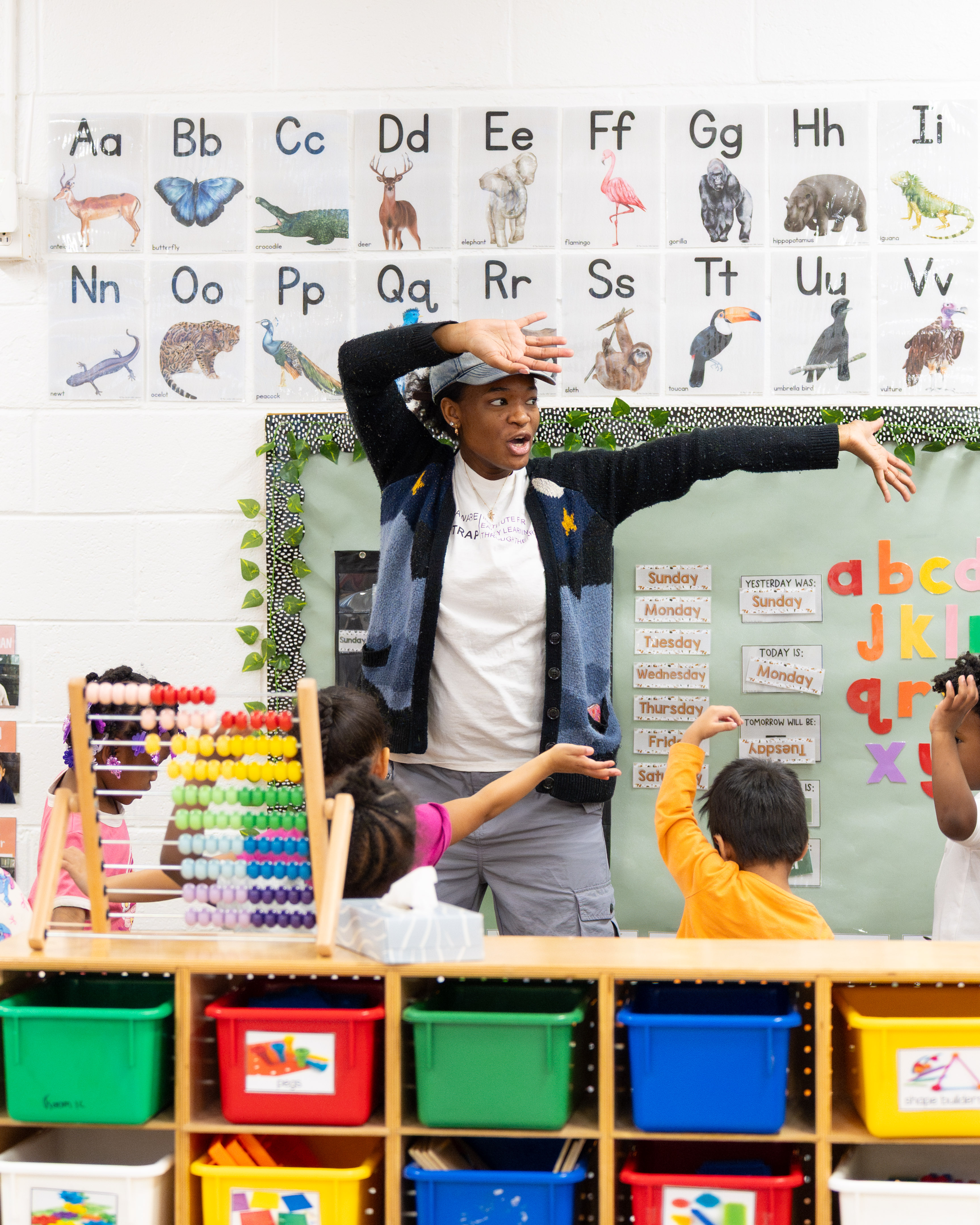 an instructor working with children