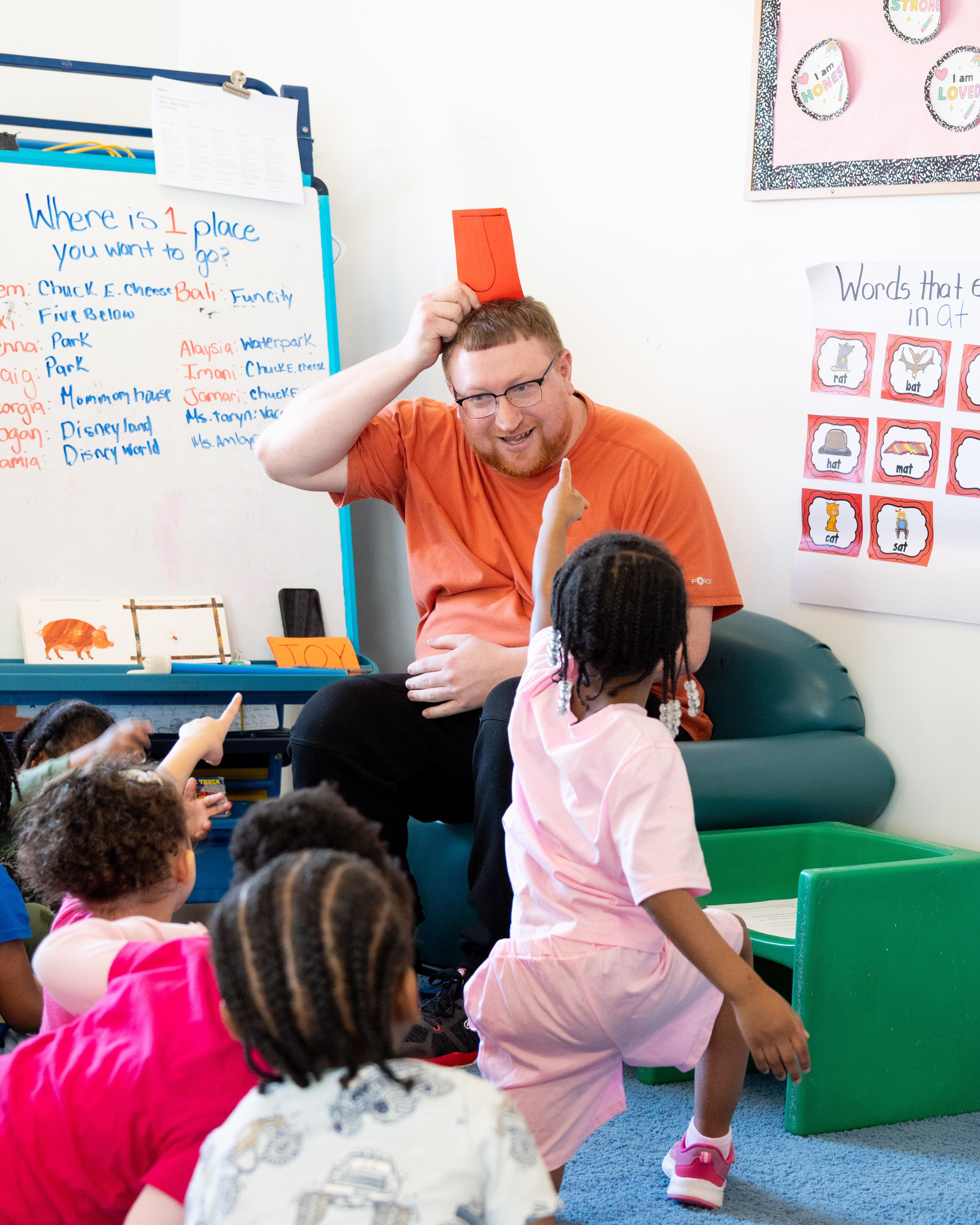 an instructor working with children