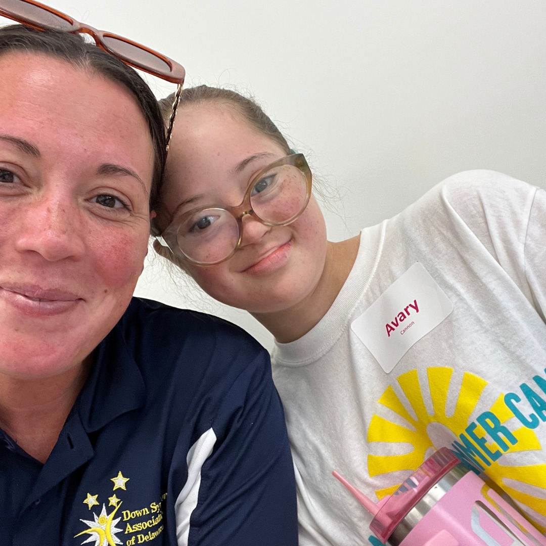 an adult and youth participant in a summer program.