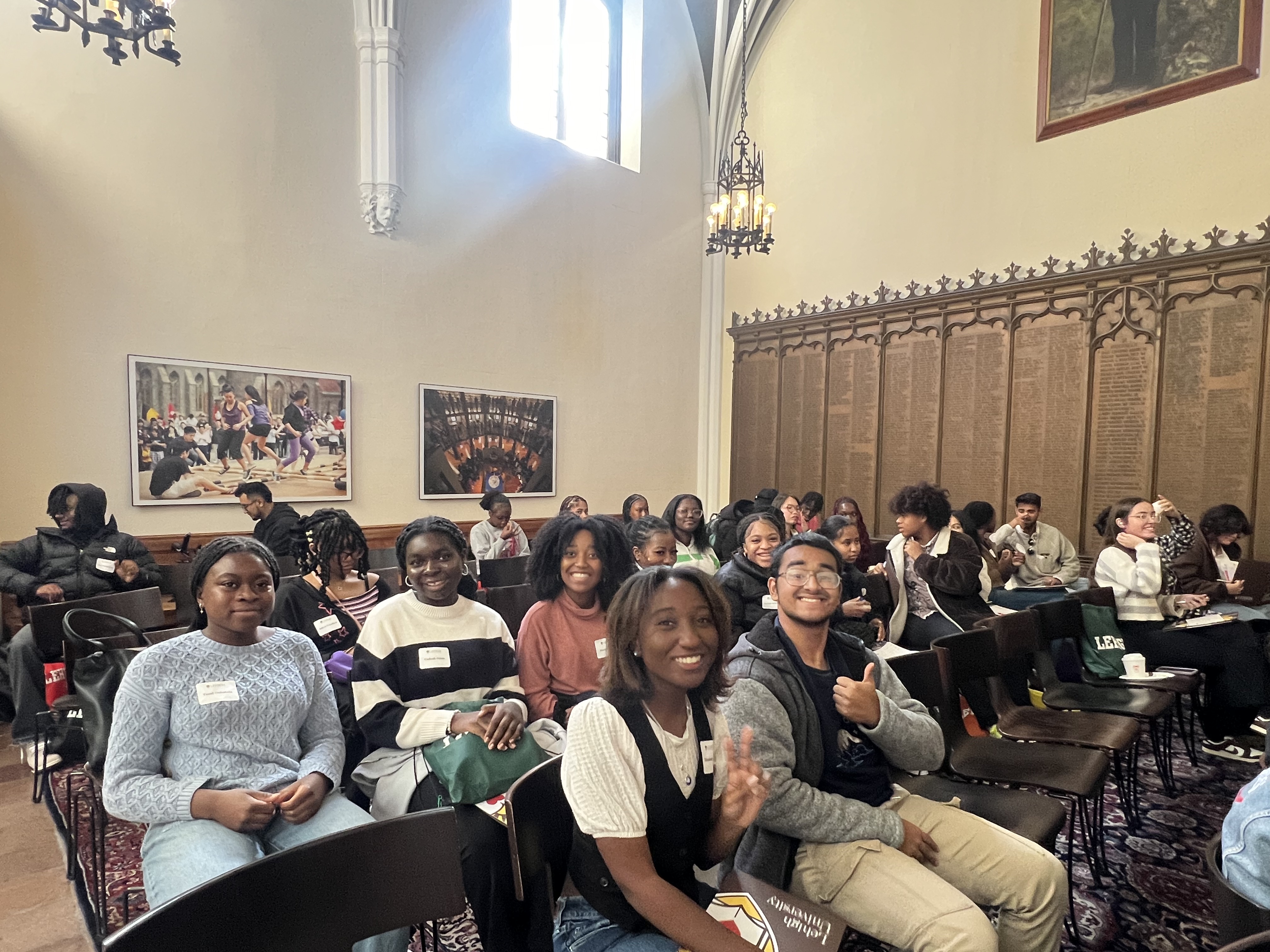 students sitting in an auditorium