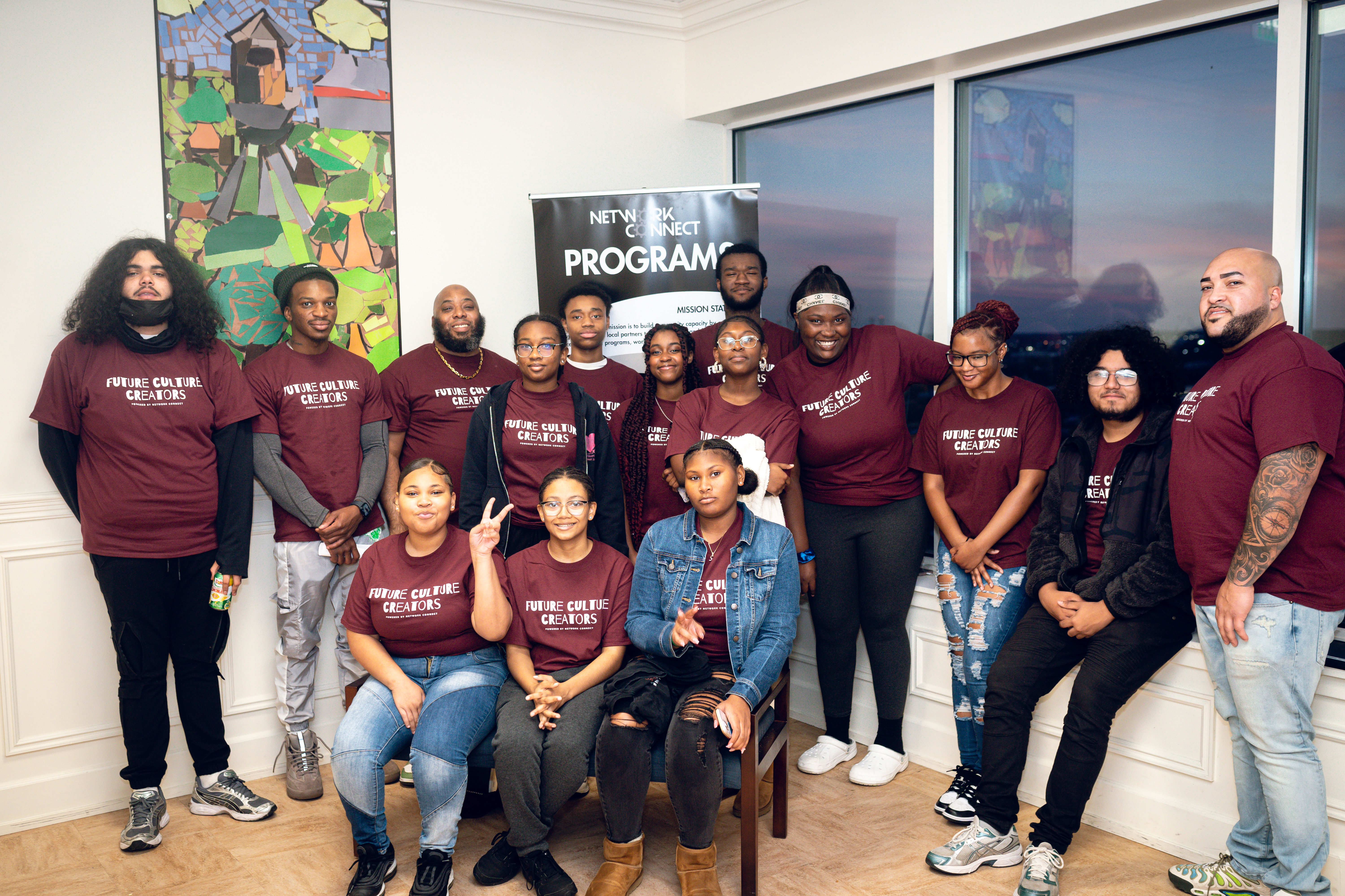 participants in a program posing for a photo