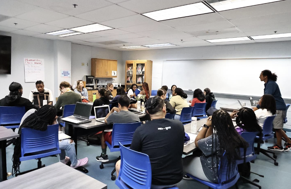 students participating in a classroom