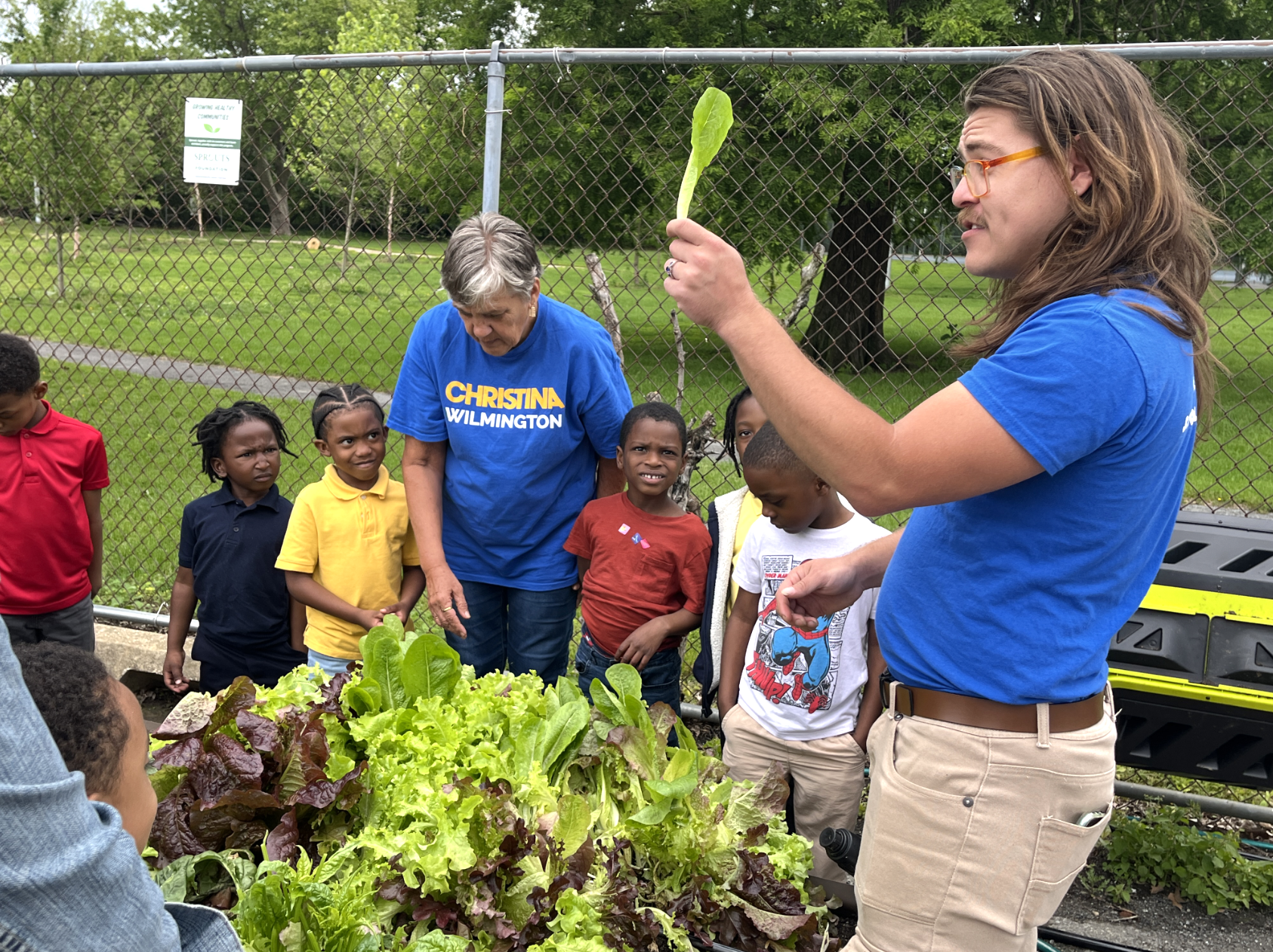 students working in a garden