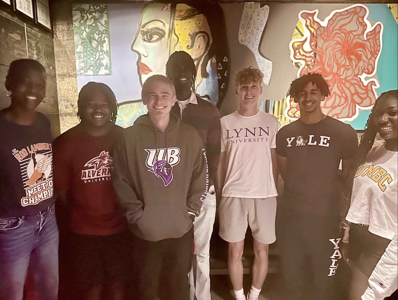 children posing in school uniforms