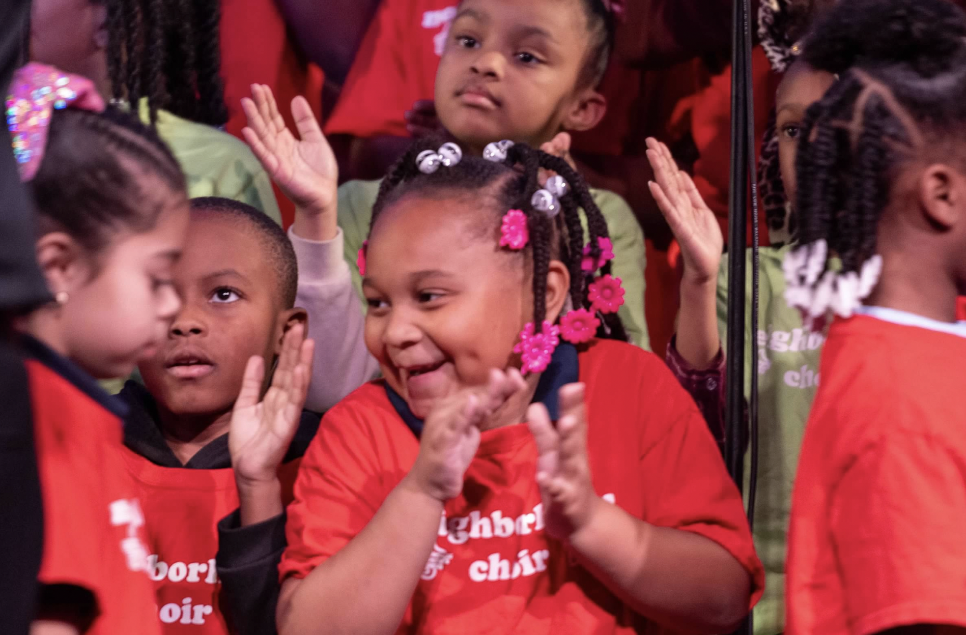 students singing in a performance