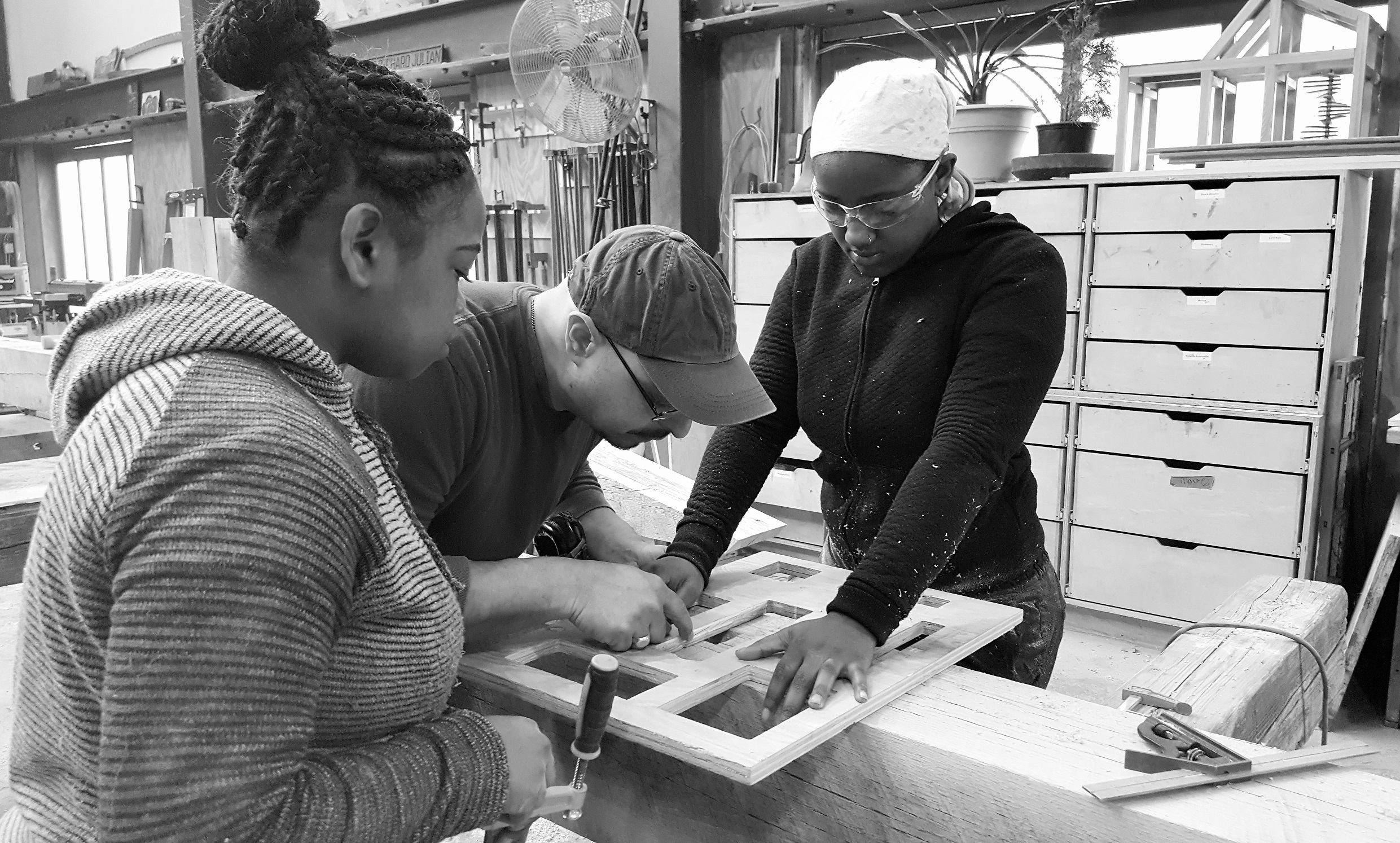 teens working in a woodshop