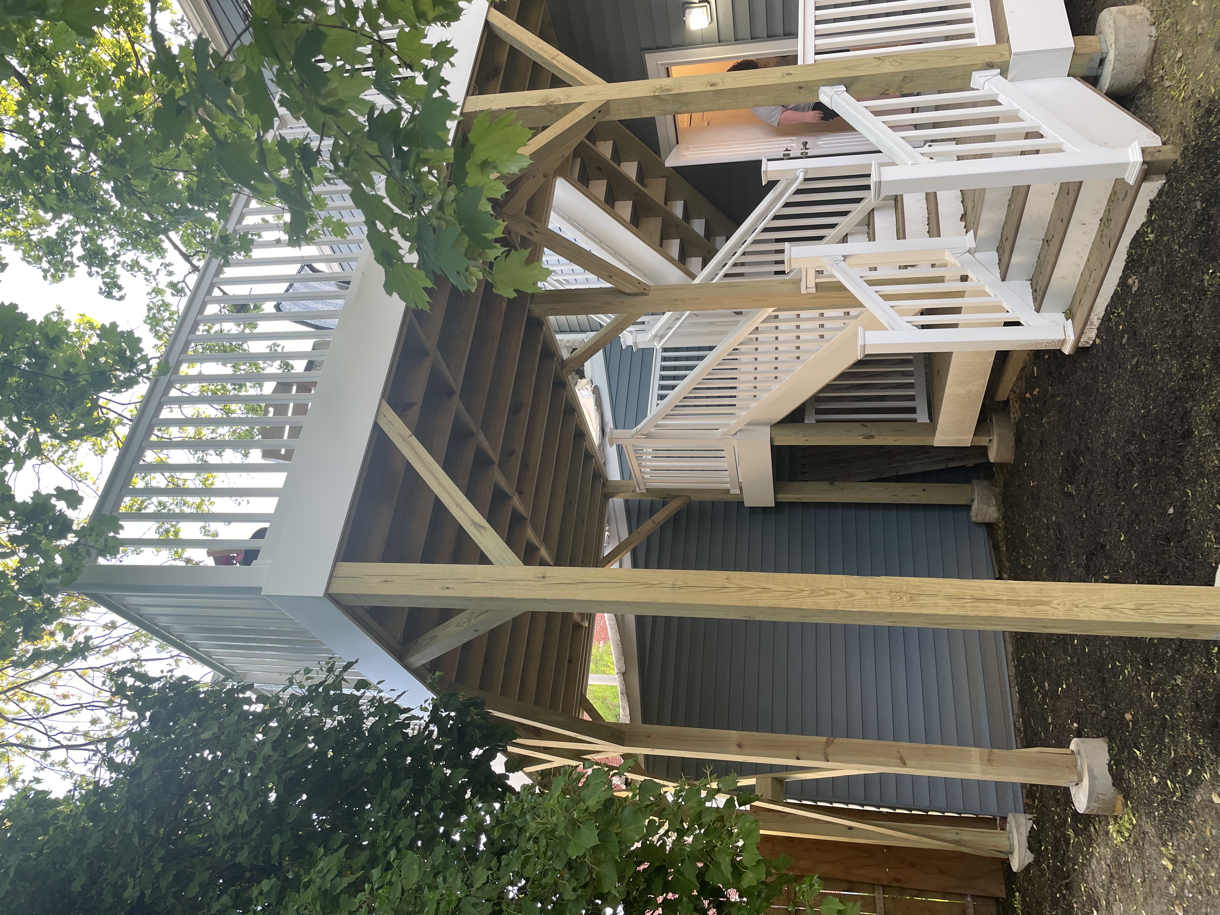 a photo of a back deck and staircase.