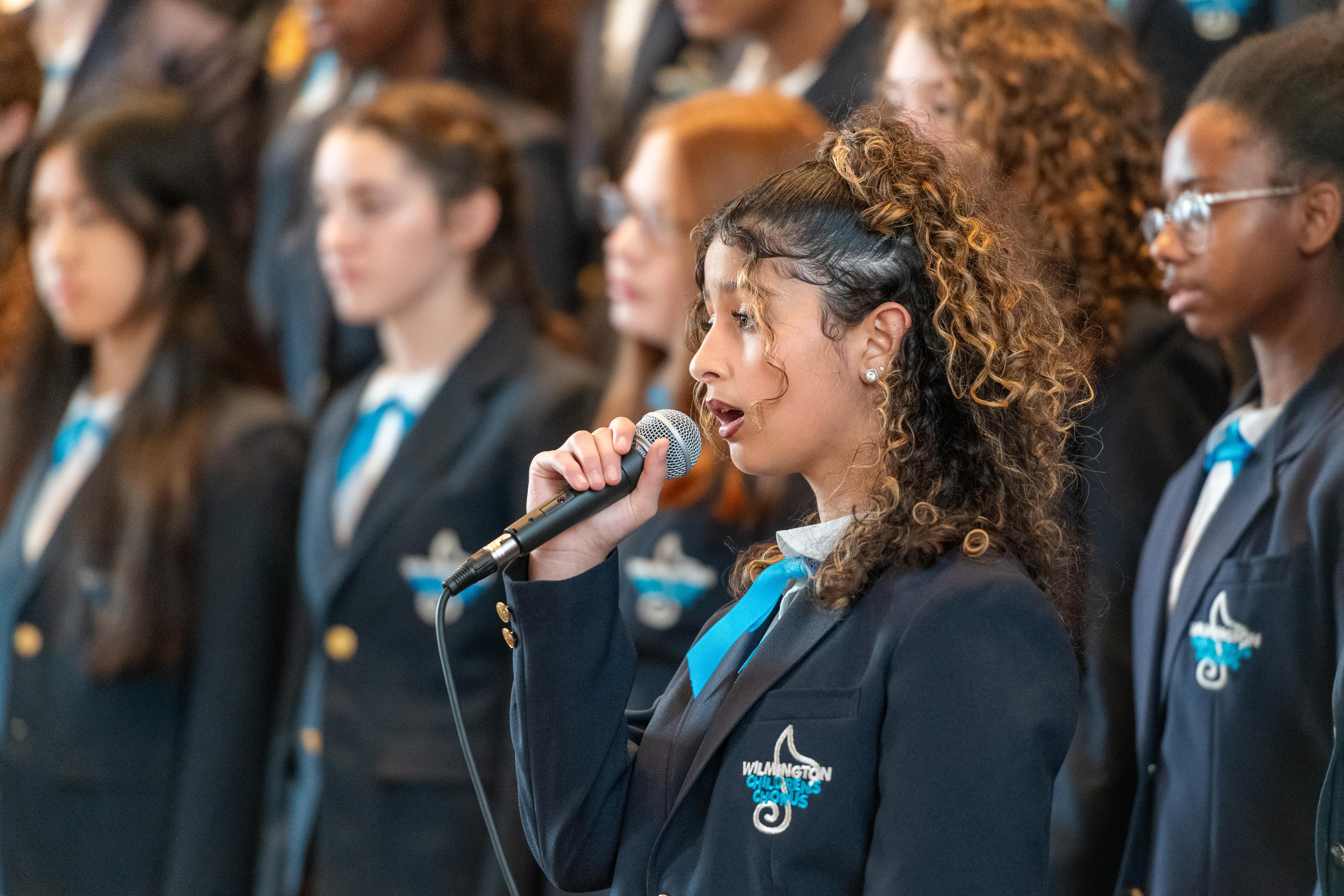 students performing in a choir event