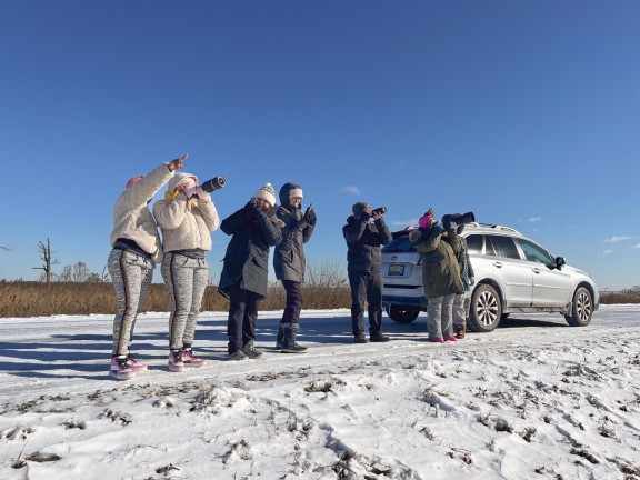 students taking photos of nature