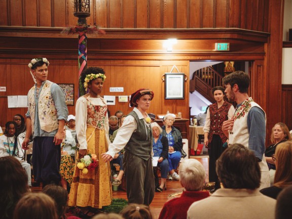 participants performing in a play