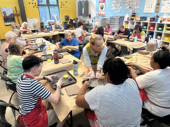 a group of participants making arts and crafts.