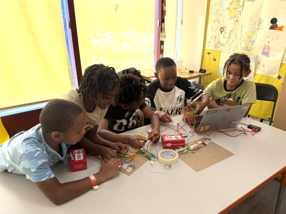 students working on a science activity