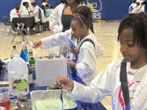 children conducting a science experiment