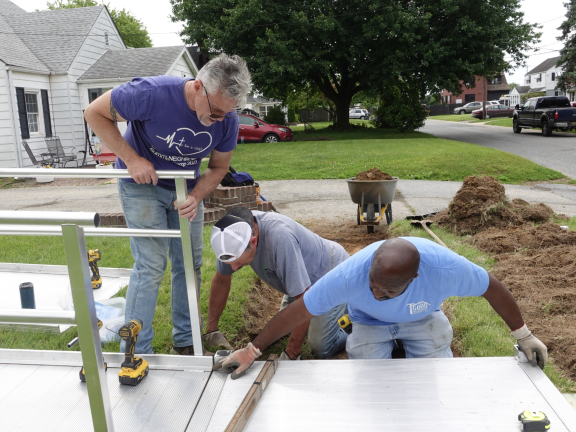 volunteers fixing a home