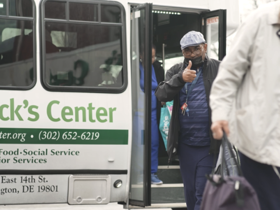 persons exiting an organization's van