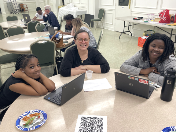 participants being mentored in a recreational room