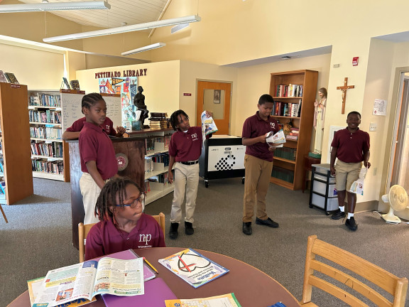 students acting in a classroom