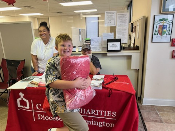 families receiving items in a distribution effort