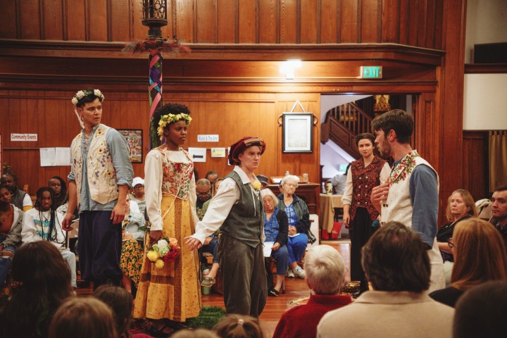 participants performing in a play