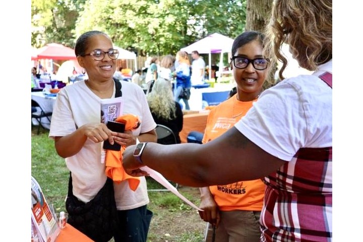 community health workers tabling in the community