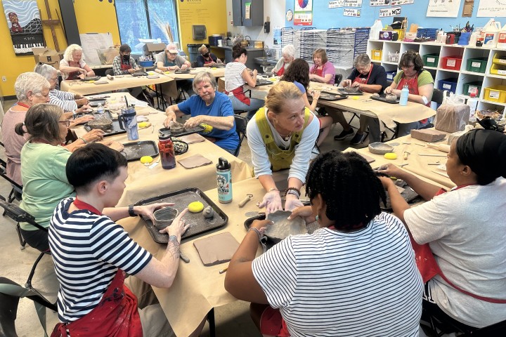 a group of participants making arts and crafts.