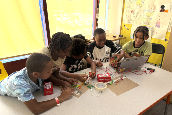 students working on a science activity