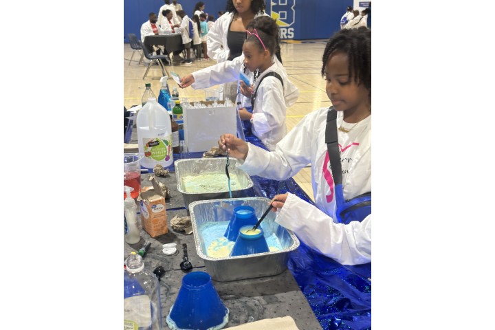 children conducting a science experiment