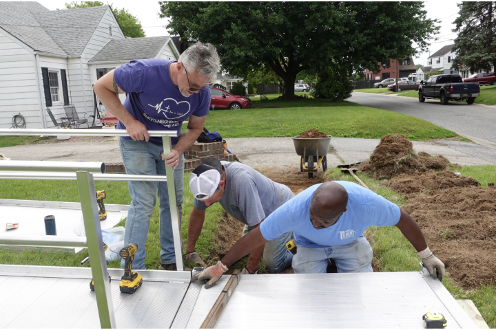 volunteers fixing a home