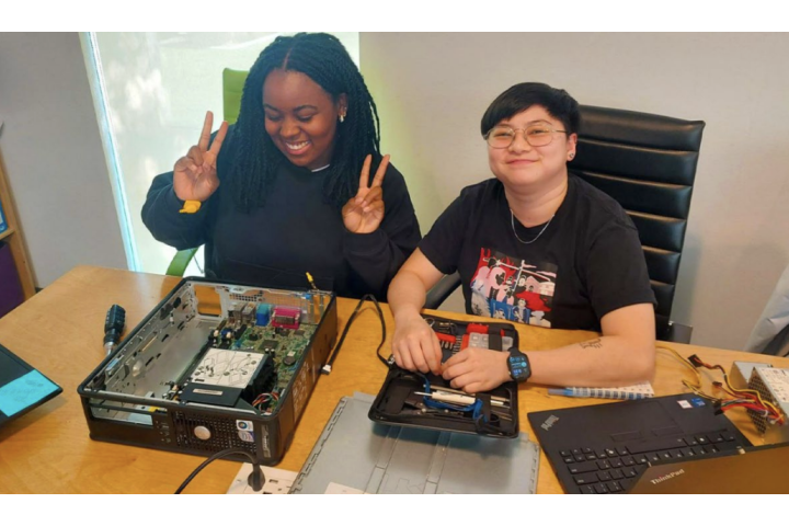 participants working on computer materials