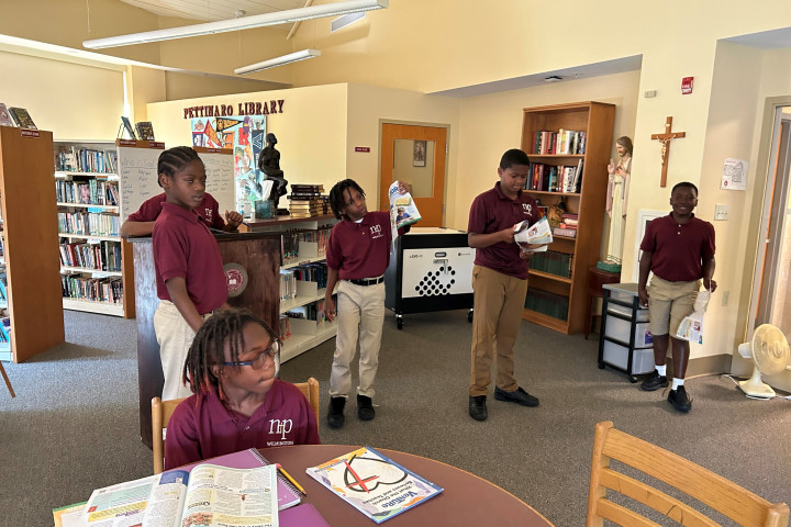 students acting in a classroom