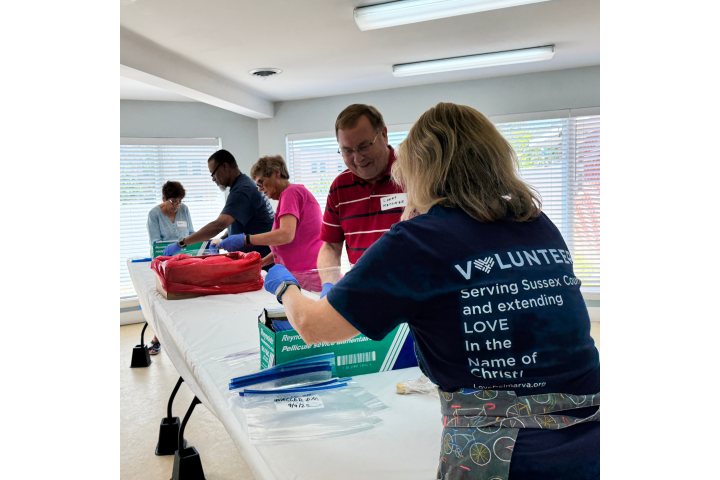 volunteers preparing items for a service project
