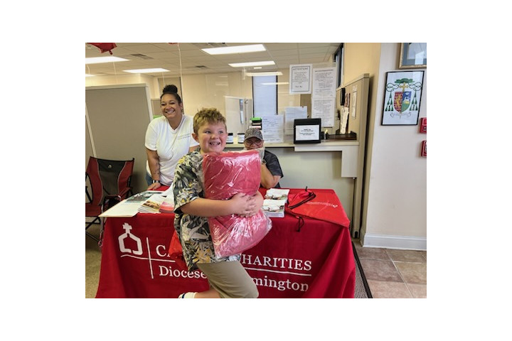 families receiving items in a distribution effort